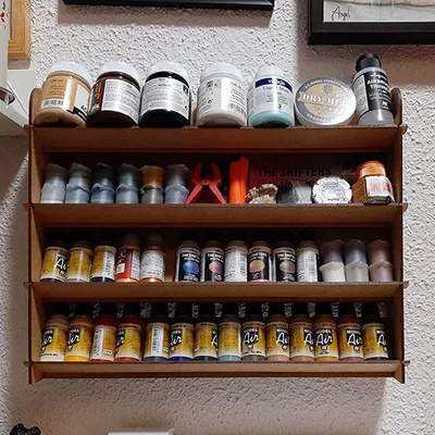 Vertical wall paint rack